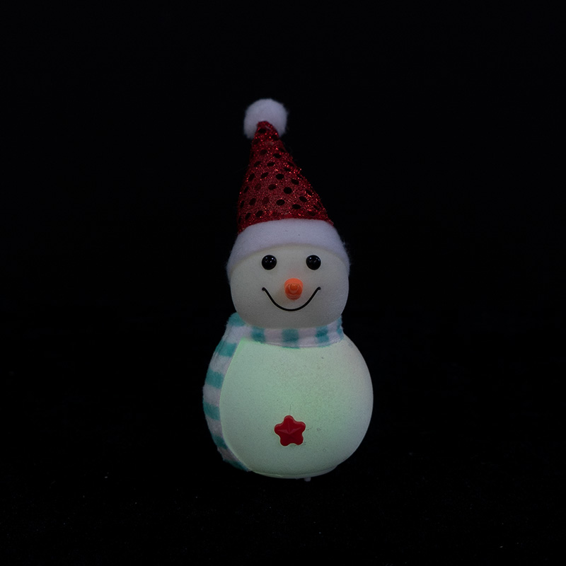 White flannel snowman with red hat